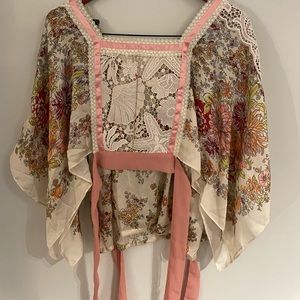 Anthropologie sold brand tiny world super cute, really unique blouse NWT.